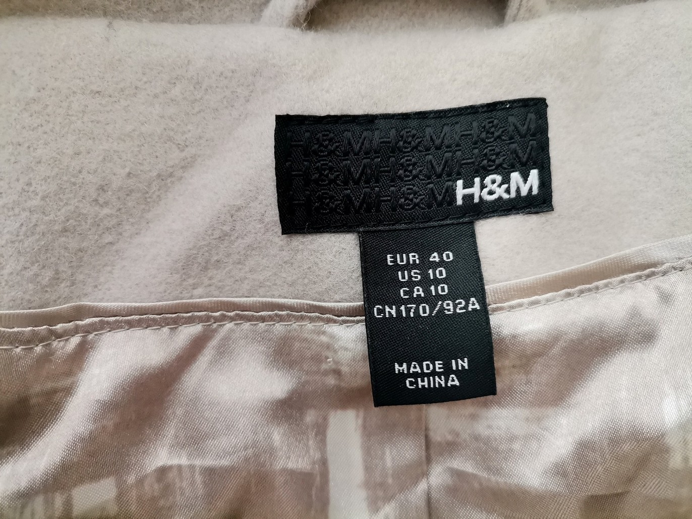 H&m Rozmiar 40 Kolor Beżowy Płaszcz Długi rękaw Materiał Wełna