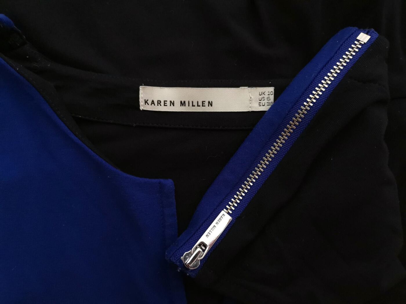 Karen MILLEN Rozmiar 10 (38) Kolor Czarny Split Crew Neck Bluzka Peplum Krótki rękaw