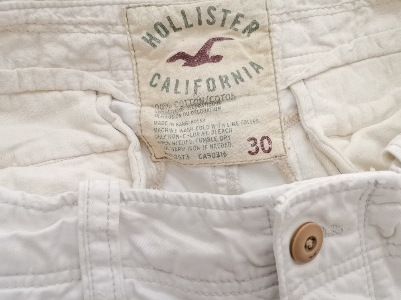 Hollister Rozmiar 30 Kolor Kremowy Materiał Bawełna 100%