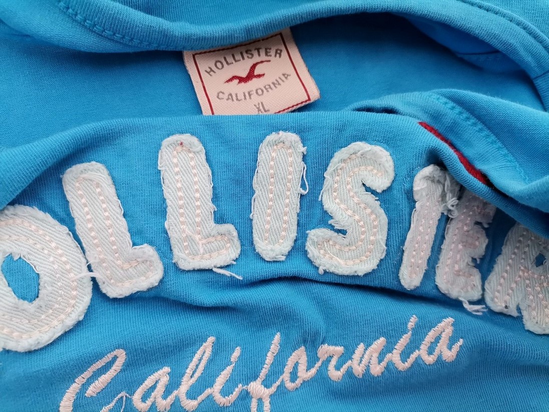 Hollister Rozmiar XL Kolor Niebieski Okrągły dekolt Bluzka Bezrękawnik Materiał Bawełna 100%